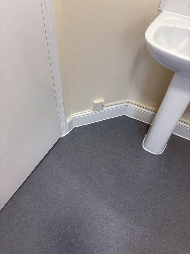 The same bathroom, the basin corner, after the works