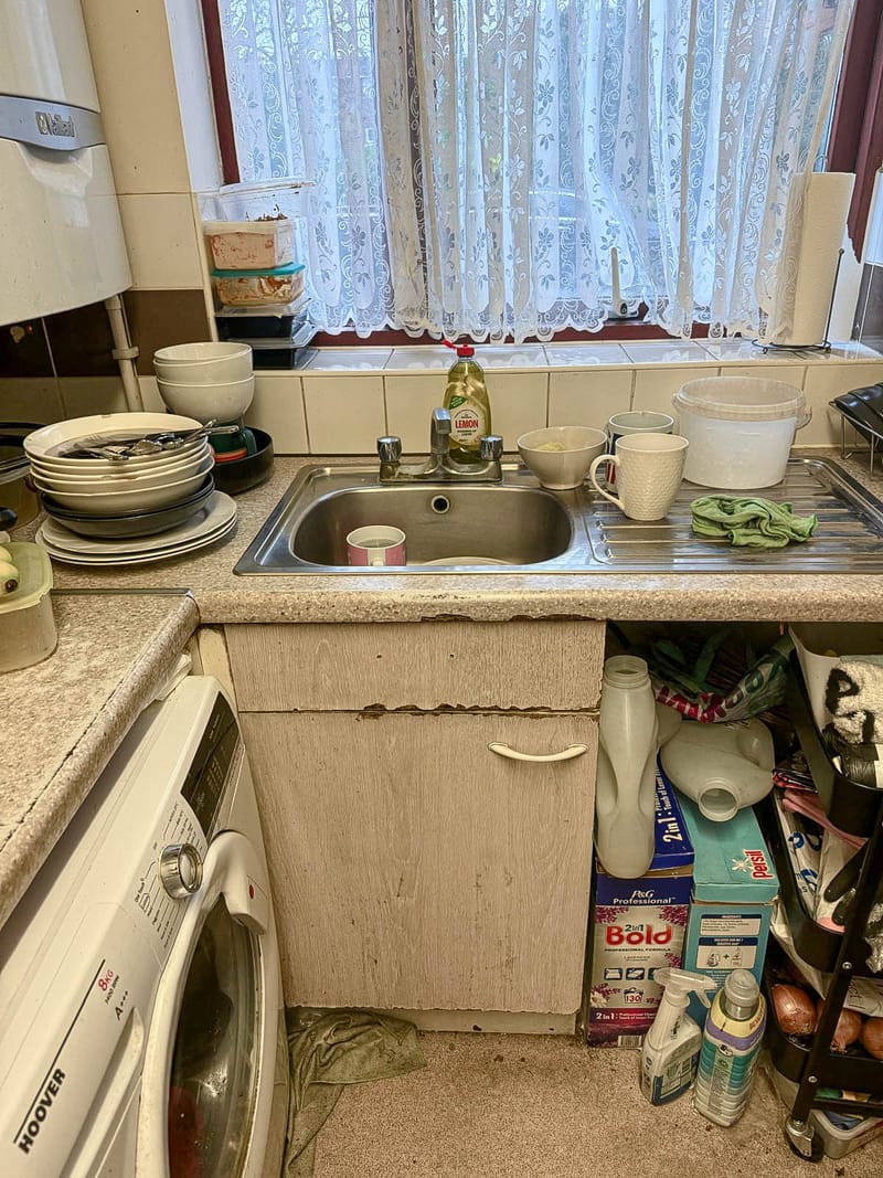 The same kitchen, looking back toward the sink, before the works