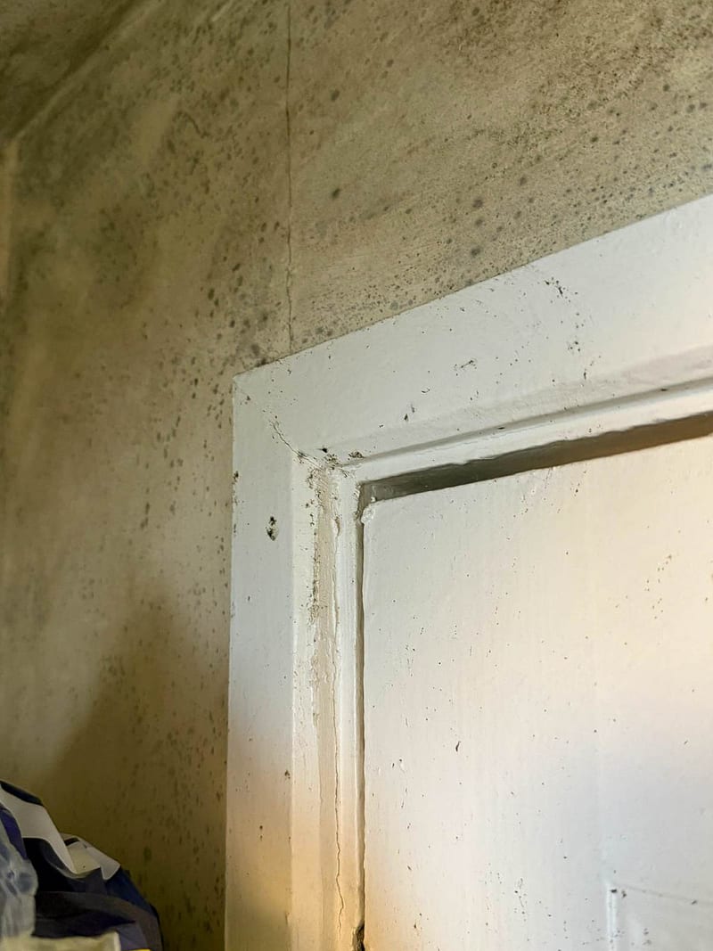 The same bedroom, the door reveal, before the works