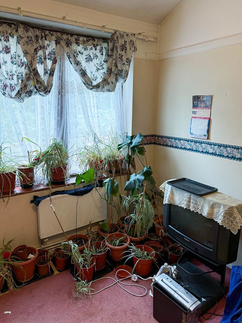 The lounge of the same property, before the works
