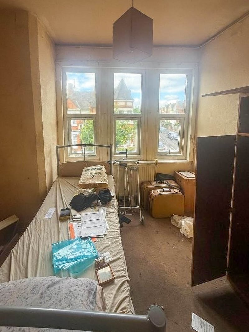 A front bedroom in a second void property, before the works
