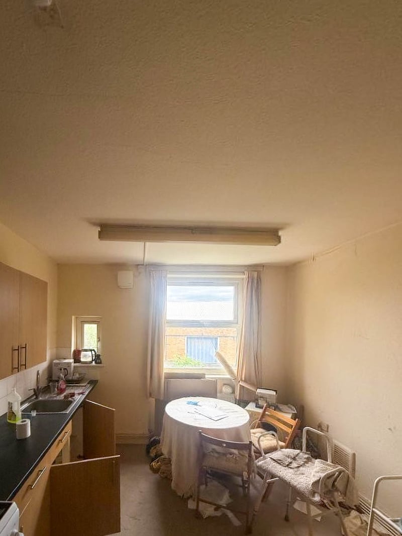 The same property, the kitchen and dining area, before the works